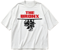 White oversized Sneaker Hang tee with red The Bronx lettering above a black hanging-sneakers design.