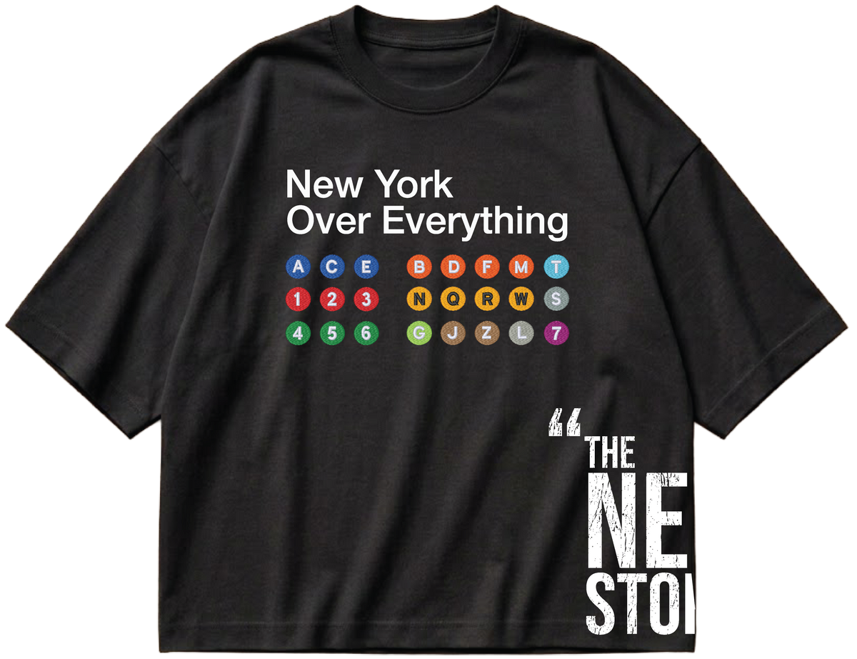 Front of the Ashy Black NYOE MTA Tee in the unisex cropped boxy fit, showing the New York Over Everything design