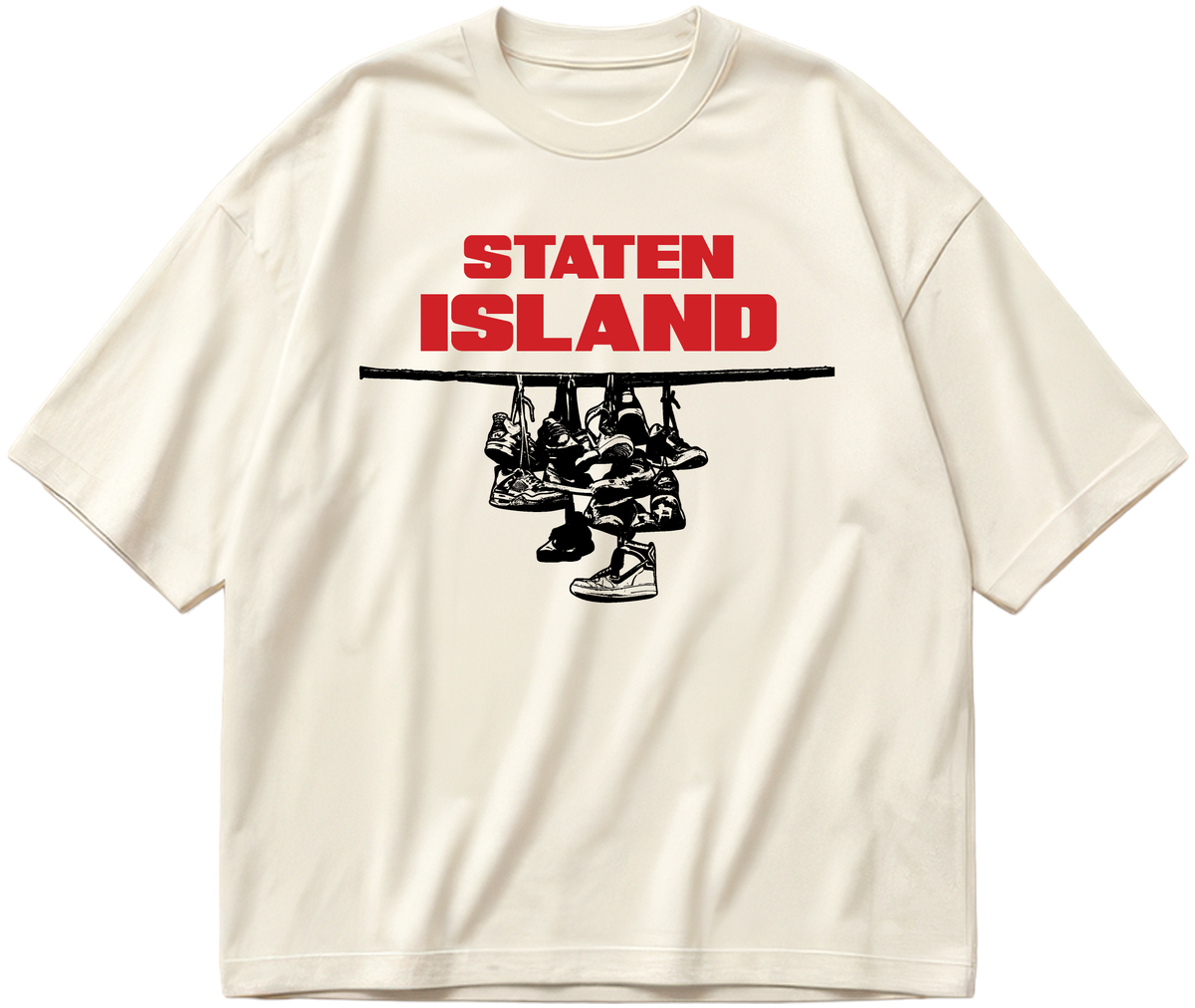 Off-white oversized Sneaker Hang tee with red Staten Island lettering above a black hanging-sneakers design